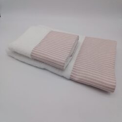 Coppia di asciugamani spugna di cotone bordata in tessuto